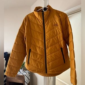 Great Puffer Jacket from North face. Perfect Fall Color.